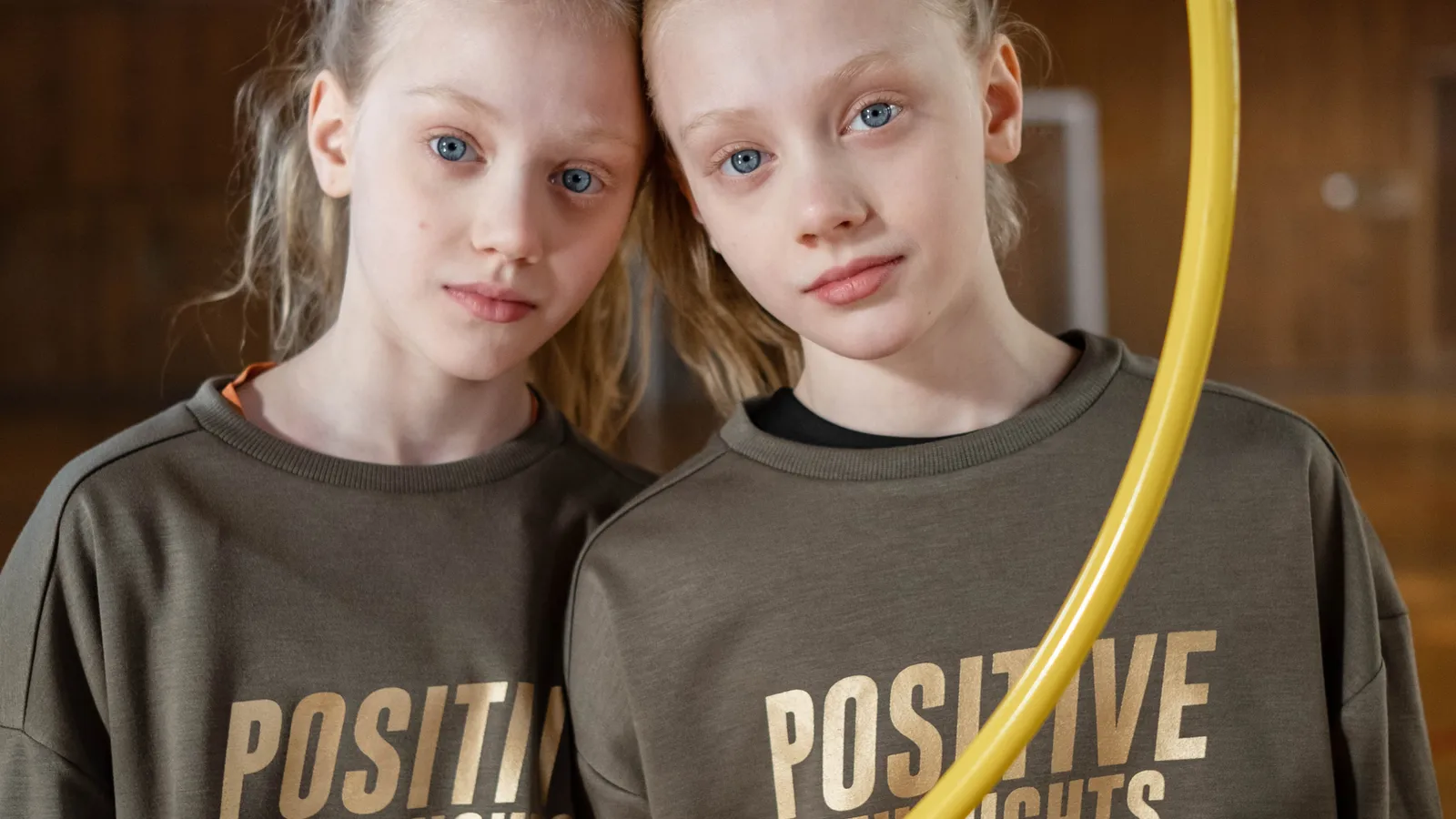 Twins comparing health and fitness progress together